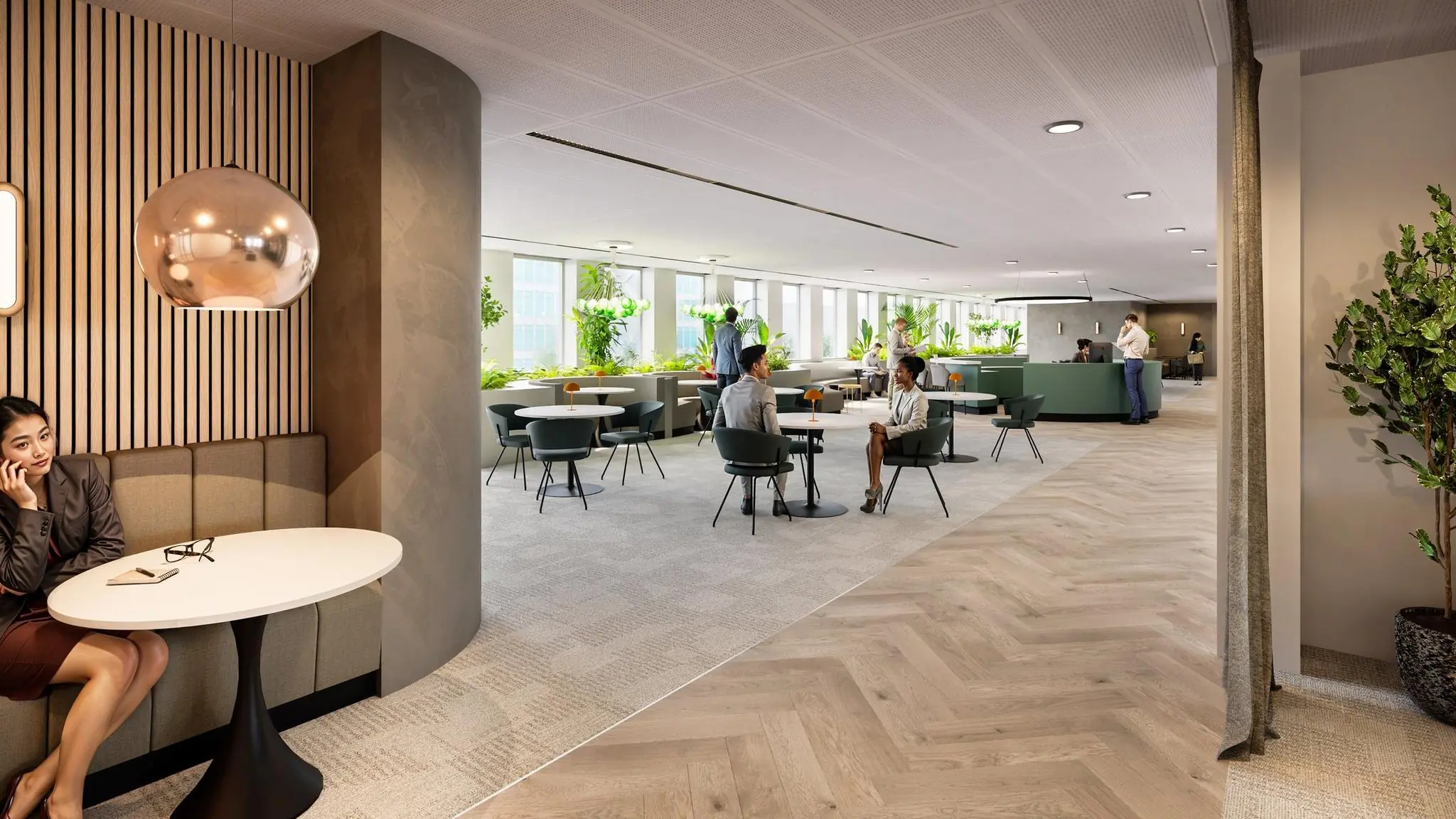 Moderne en sfeervolle kantoorlobby De Entree met zitgedeeltes, planten en mensen in gesprek.