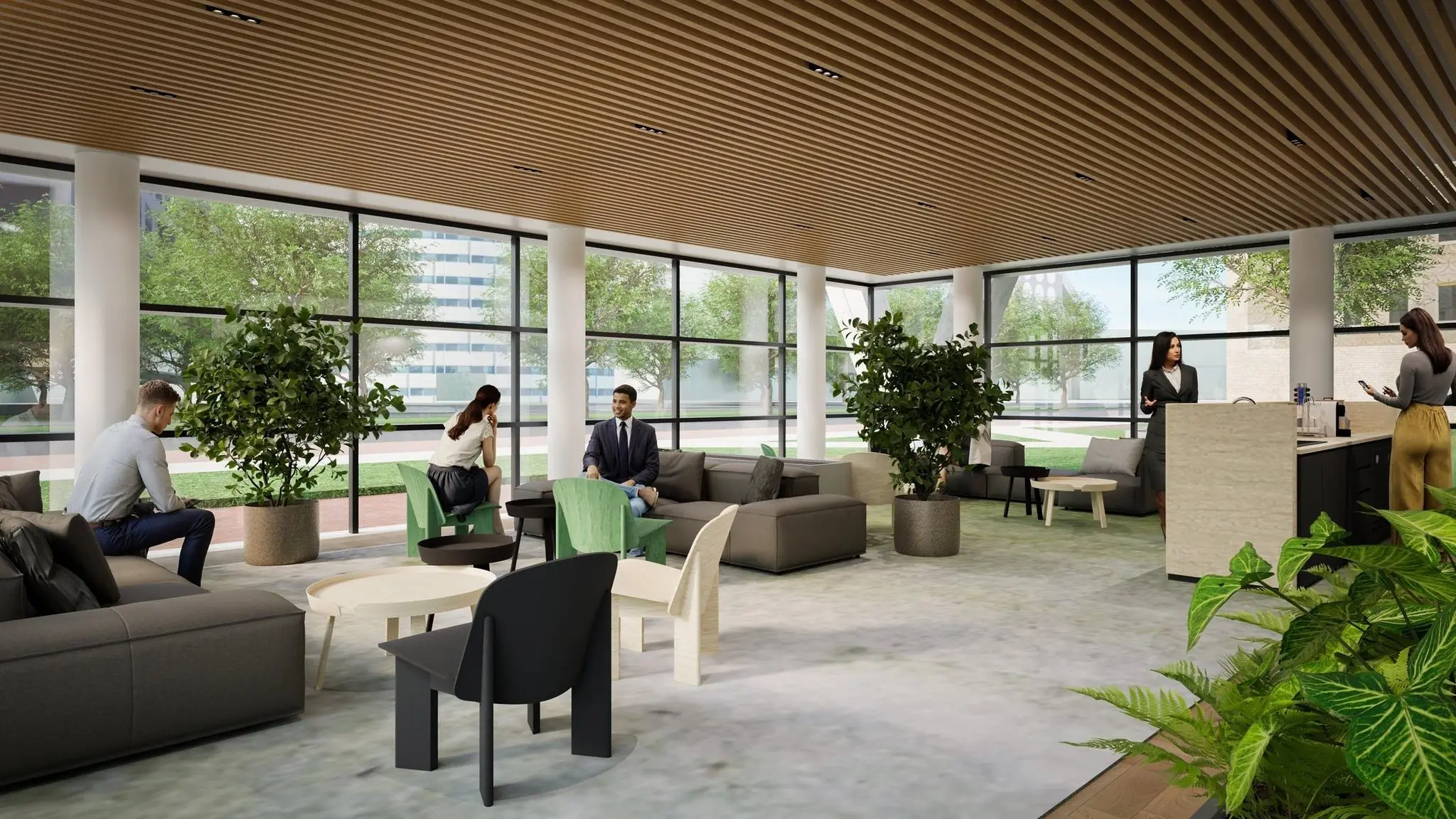 Moderne en lichte entreehal met zithoeken, planten, en mensen in gesprek of wachtend.