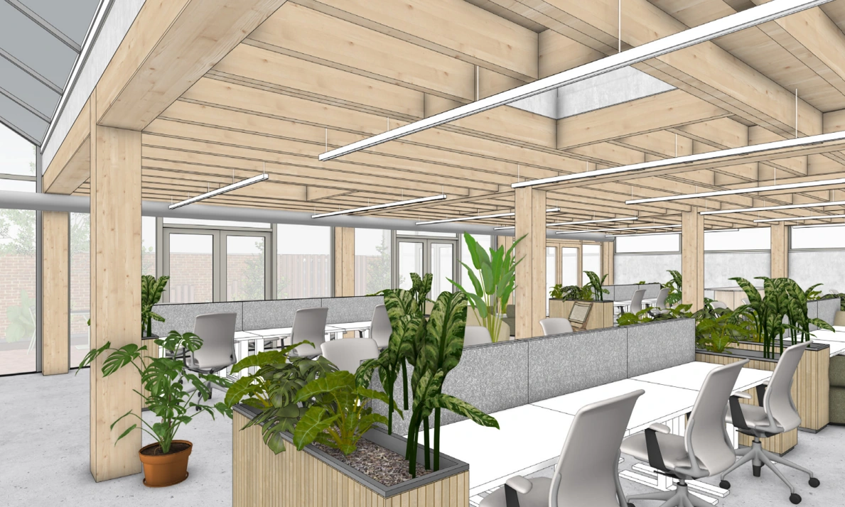 Licht en modern kantoorinterieur aan de Ruysdaelstraat met houten plafond, open werkplekken en veel groene planten.