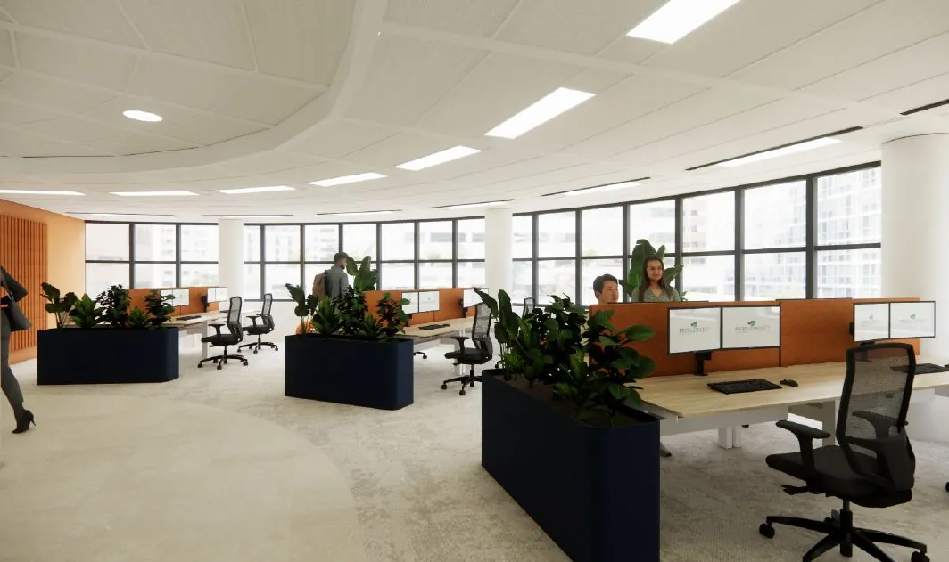 Een moderne, lichte kantoorruimte met meerdere bureaus, planten en grote ramen.