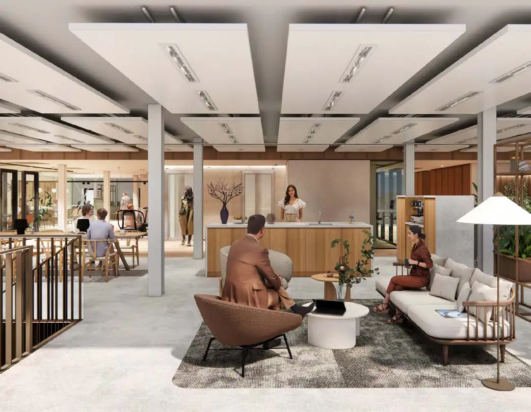 Modern office lobby at Nieuwe Vaart with people interacting in a stylish, open seating area.