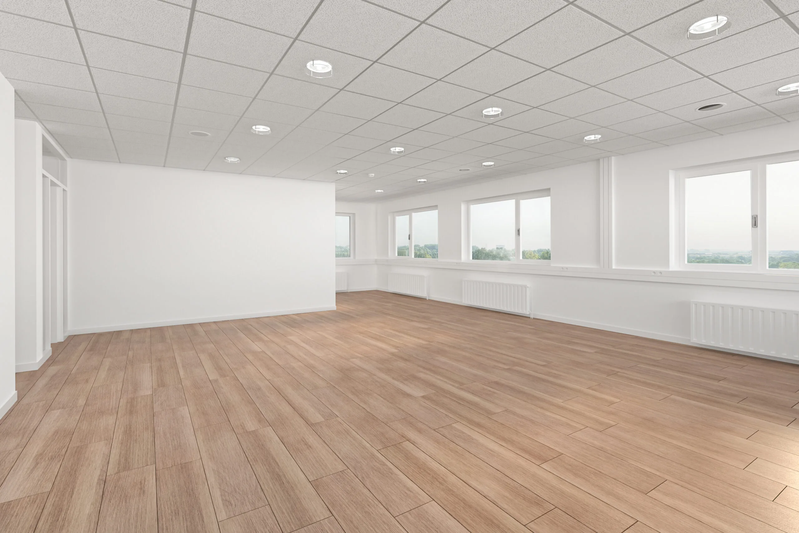 Leeg, licht kantoorruimte met houten vloer aan de Laan van S-Gravenmade.