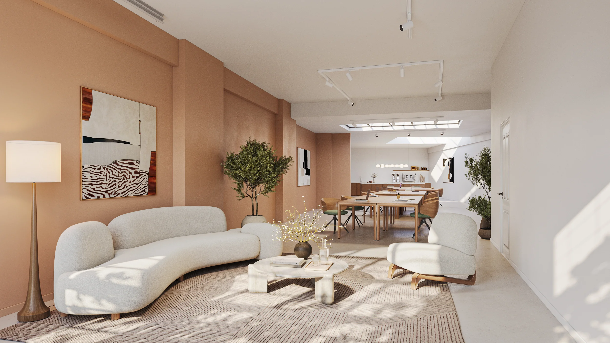 Modern ingerichte woonkamer aan de Baarsjesweg met licht meubilair, kunst aan de muur en een open eetruimte.