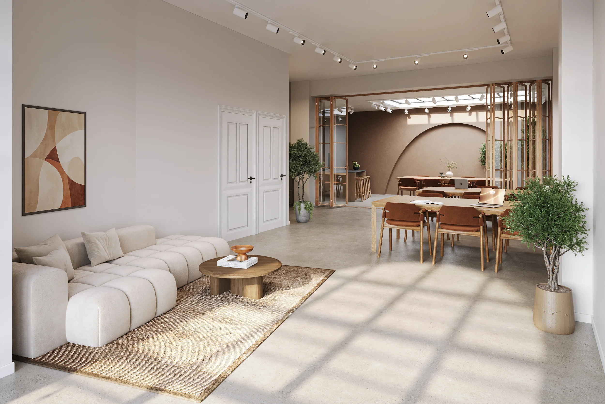Licht en modern ingericht interieur aan de Baarsjesweg met zithoek, eettafel en open werkruimte.