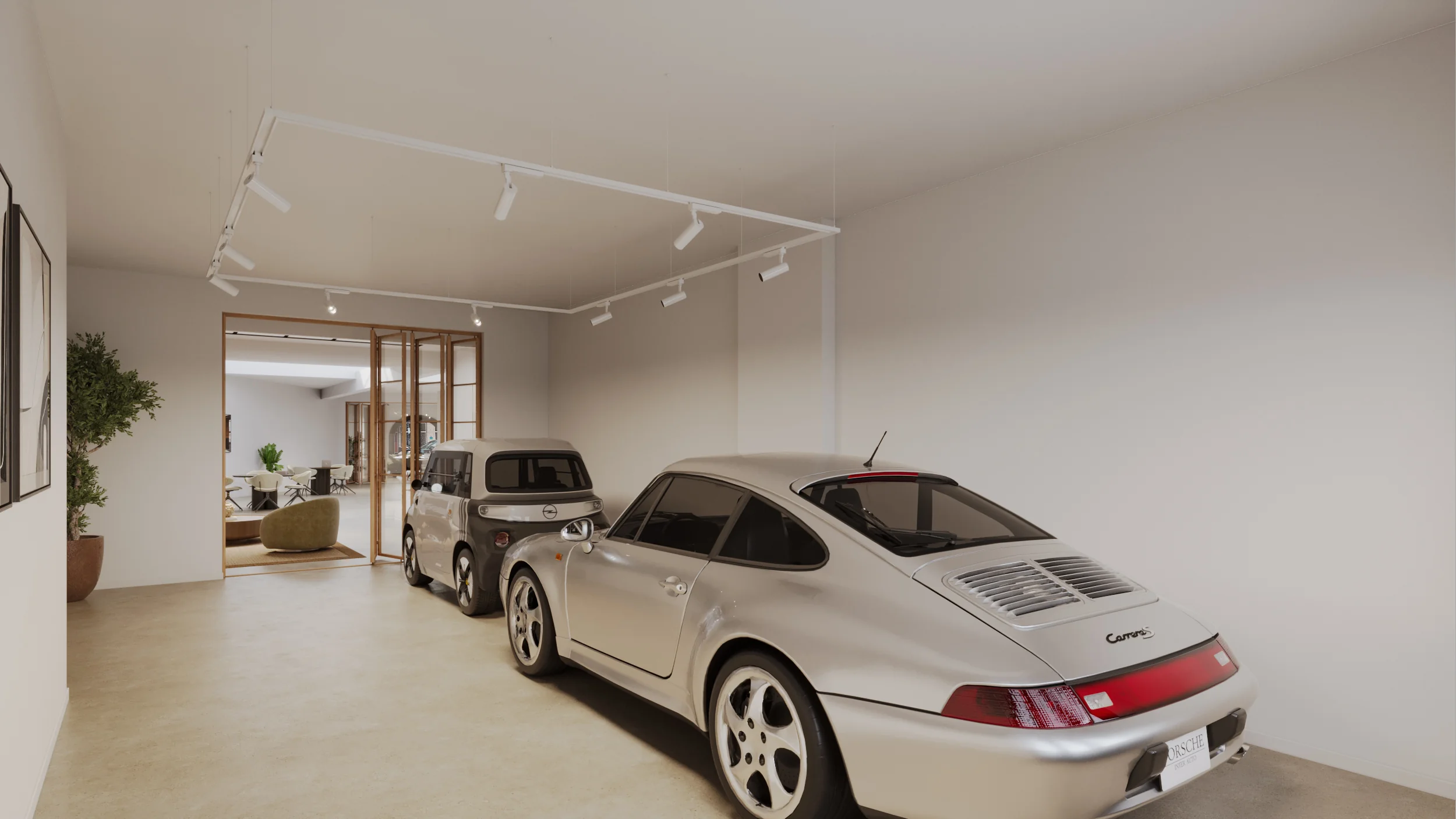 Luxe inpandige garage aan de Baarsjesweg met twee geparkeerde auto’s, waaronder een zilveren Porsche Carrera.