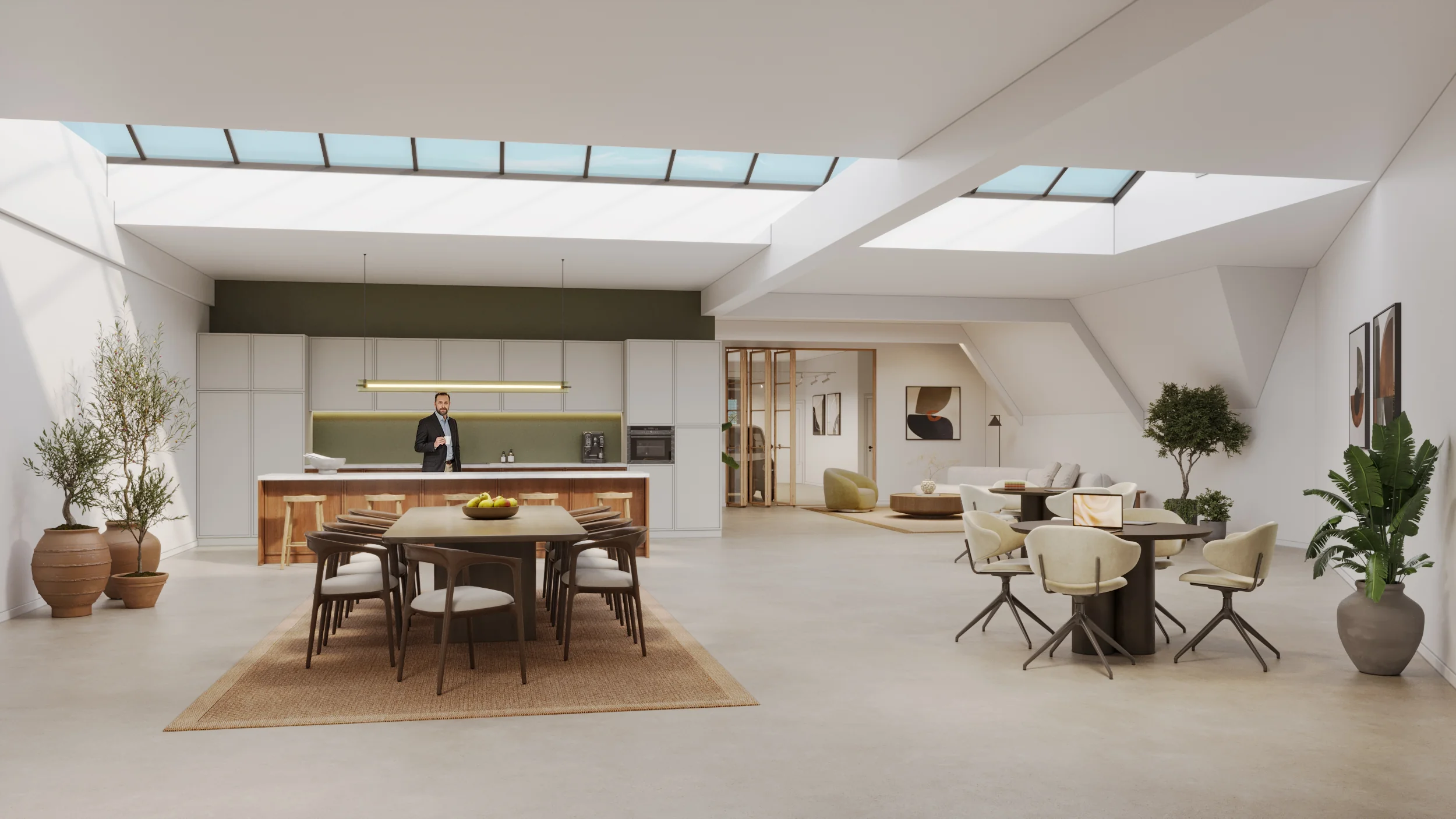 Modern en licht appartement aan de Baarsjesweg met open keuken, eethoek en zithoek onder grote dakramen.