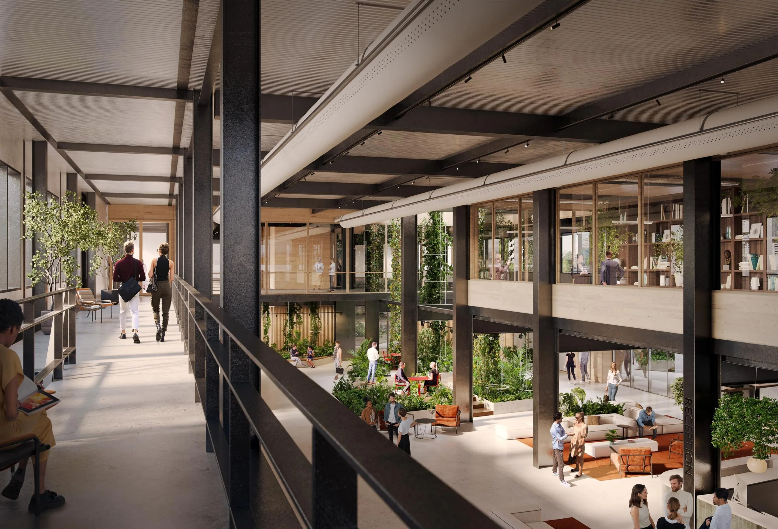 Modern en licht kantoorinterieur aan de Basisweg met open ruimtes, veel groen en mensen in gesprek of aan het werk.