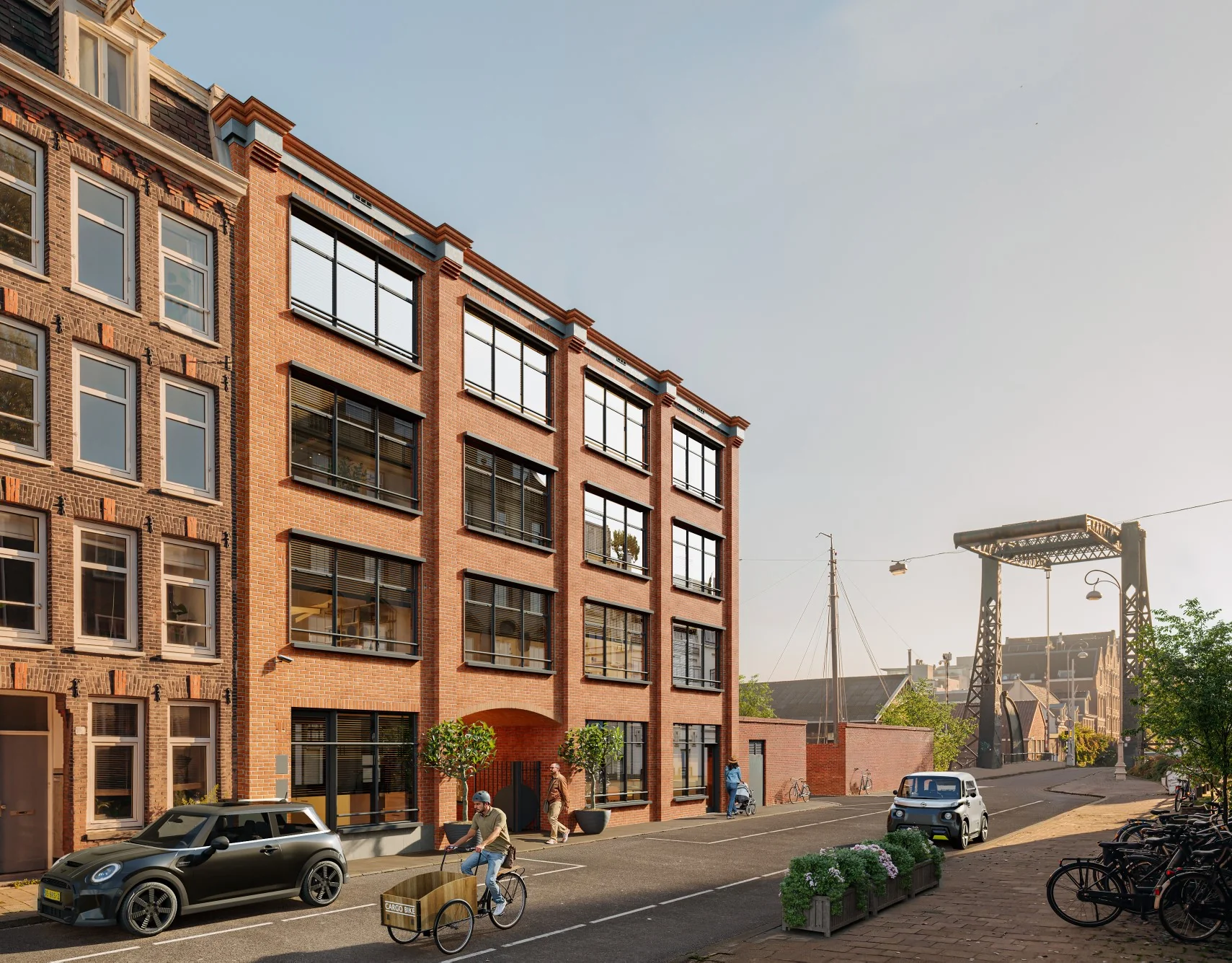 Straatbeeld in de Hoogte Kadijk met bakfietsen en auto's voor een rij historische en moderne bakstenen gebouwen, nabij een ijzeren brug.