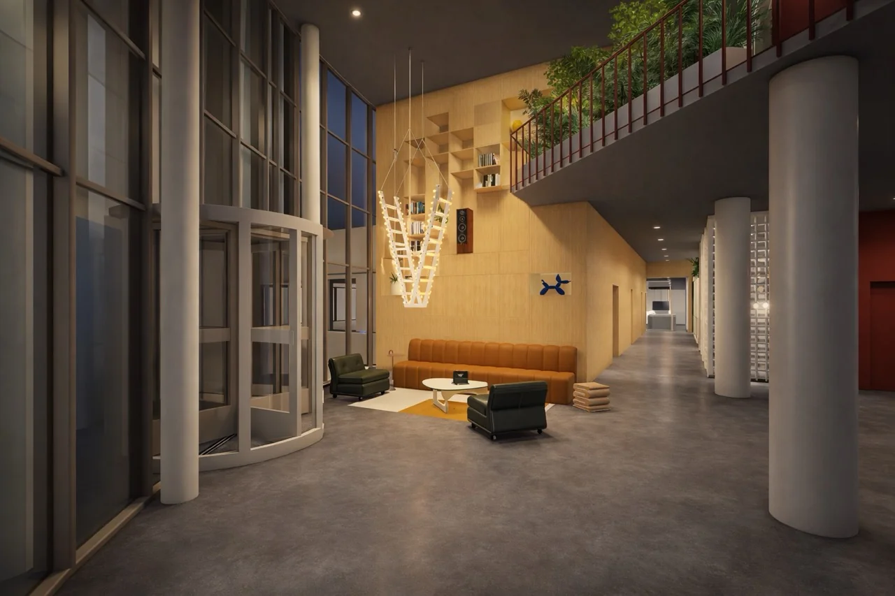 Moderne lobby met hoge plafonds, een ronde draaideur, een zitgedeelte met designmeubels en een hangende houten boekenkast.