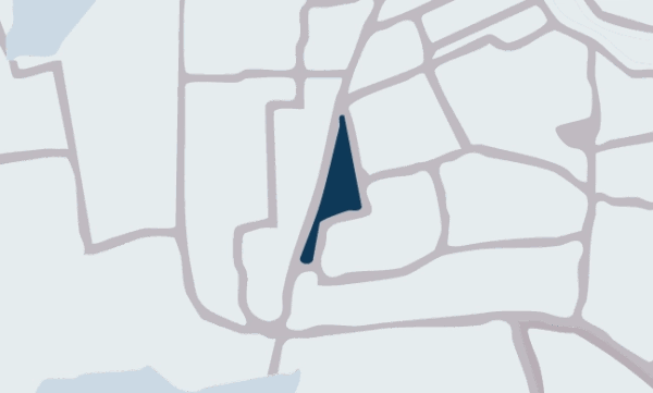 Map highlighting the Schinkel area in dark blue within a light grey street grid.