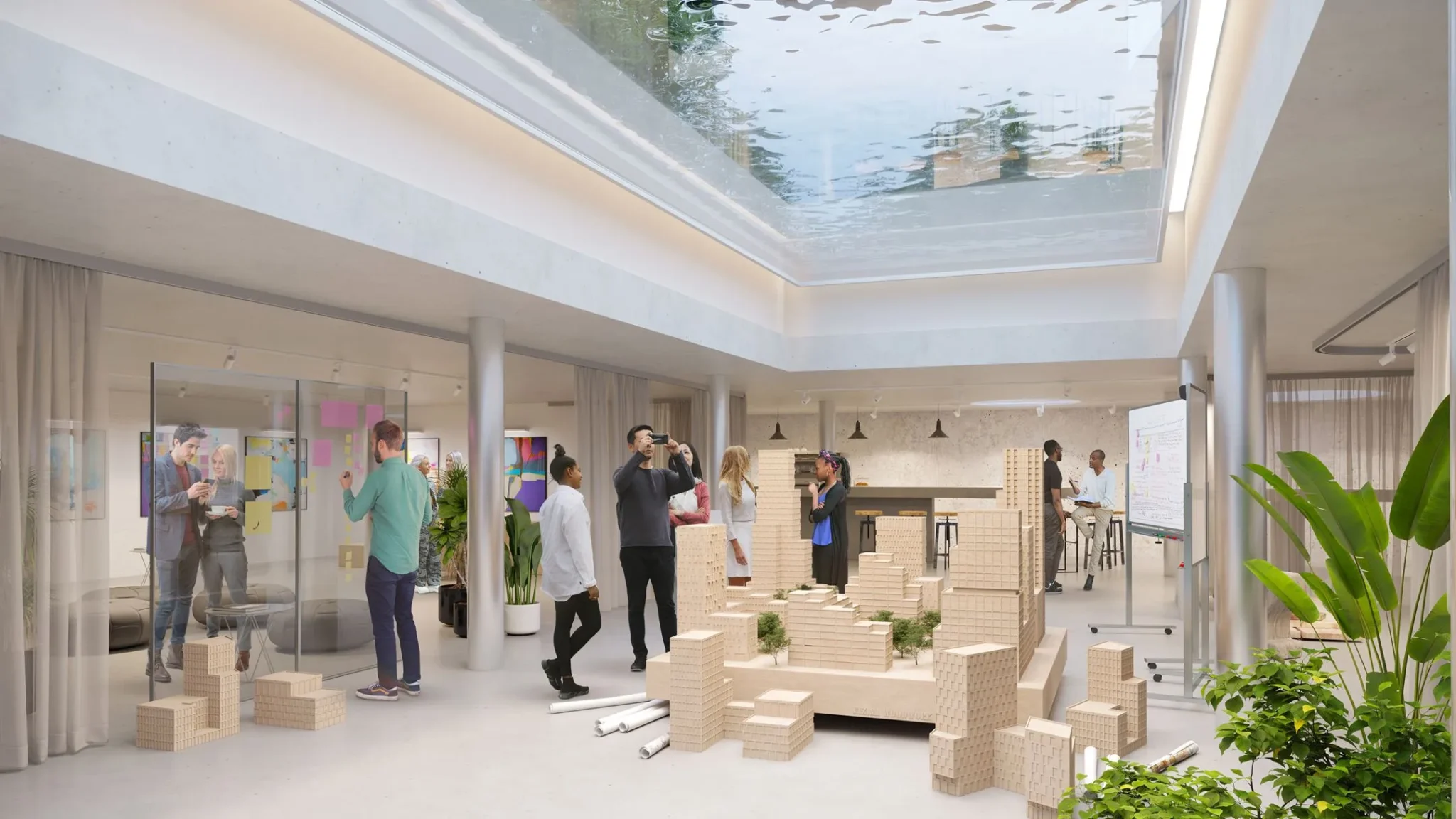 Moderne kantoorruimte op Herengracht 206 met glazen plafond, maquette van een stedenbouwkundig project en mensen die samenwerken.