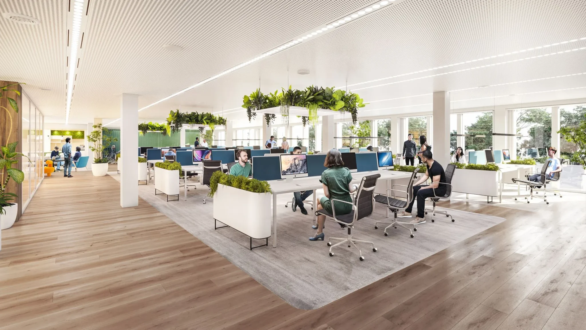 Modern en licht ingericht kantoorpand aan de Herengracht 206 met open werkplekken, planten en mensen aan het werk.