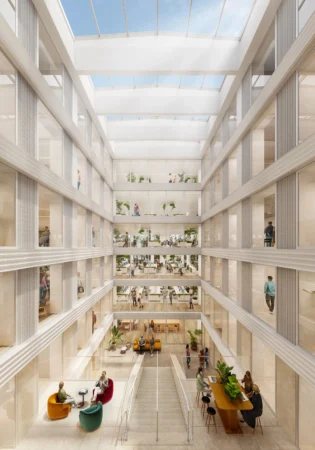 Licht atrium van Herengracht 206 met meerdere verdiepingen kantoren en ontmoetingsruimtes onder een glazen dak.