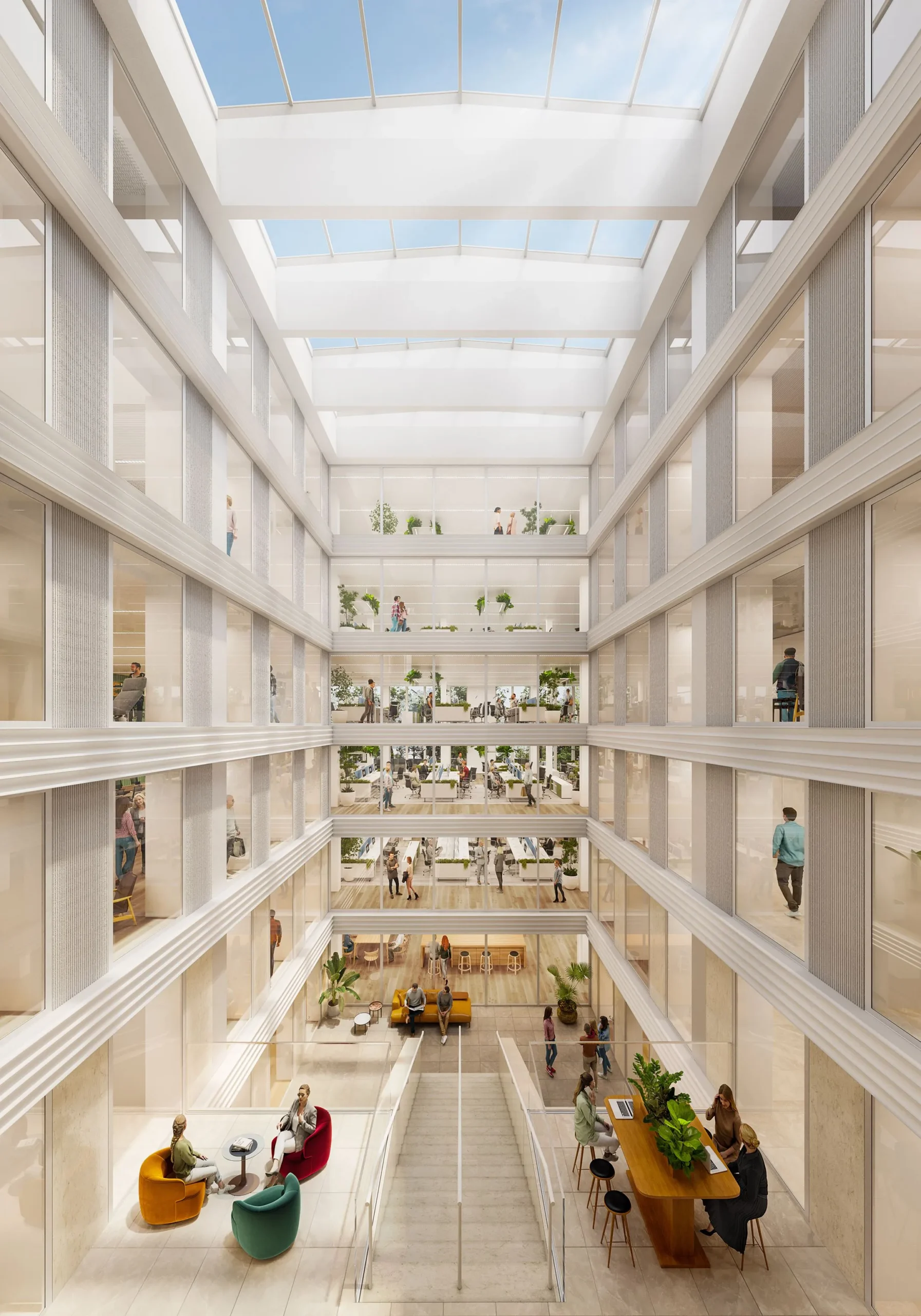 Licht atrium van Herengracht 206 met meerdere verdiepingen kantoren en ontmoetingsruimtes onder een glazen dak.