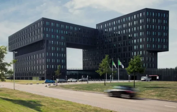 Modern office building in Utrecht Papendorp with a unique bridge-like architectural design.